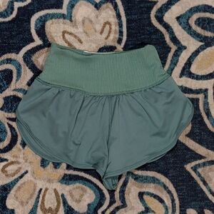 Free people movement game time green high rise athletic running shorts womens XS